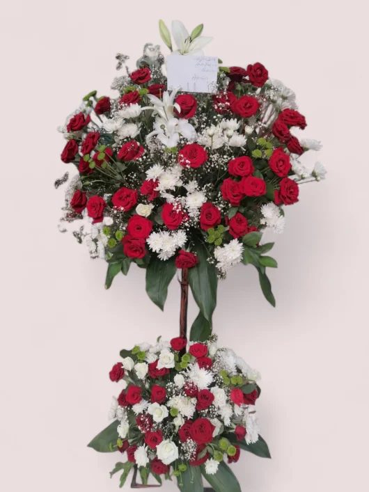 Royal Tribute red and white standing arrangement by RosaBella Flowers