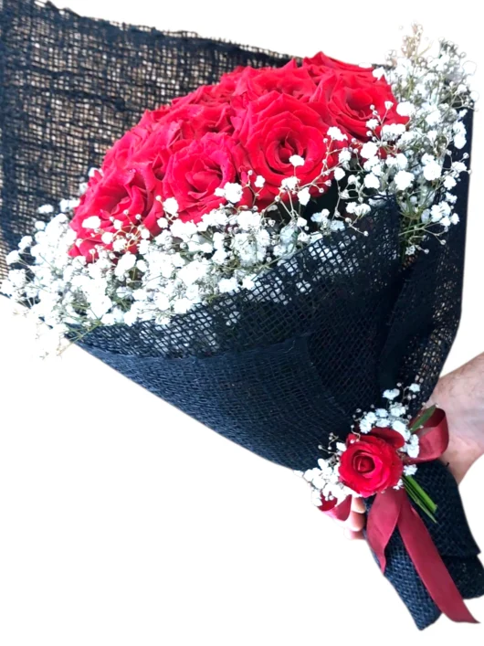 Ruby Cascade red roses and baby's breath by RosaBella Flowers