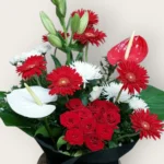 Scarlet Crown red flower arrangement by RosaBella Flowers