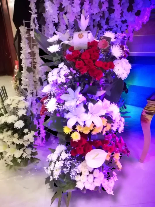 Majestic Bloom tall flower stand at a wedding by RosaBella Flowers