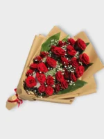 Scarlet Elegance red roses bouquet in kraft paper by RosaBella Flowers